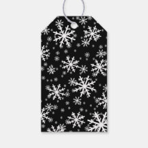 Copo de nieve blancos sobre negro