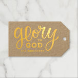 Etiquetas Para Regalos Gloria a Dios | Navidades religiosos de Rusia del<br><div class="desc">Celebra la fe en el estilo con esta elegante etiqueta de regalo "Glory to God" (Gloria a Dios), con letras radiantes de Relieve metalizado dorado en un rústico fondo de kraft. Perfecto para empaque festivo cristiano, regalos navideños, favores matrimoniales, bautizos, actos religiosos o celebraciones religiosas. La cálida combinación de oro...</div>