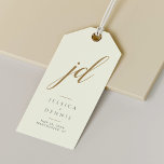 Etiquetas Para Regalos Moderno Boda de monograma minimalista elegante de<br><div class="desc">Moderno Minimal Elegante caligrafía Script Monograma Boda Etiquetas de regalo Añade un toque de elegancia a tus favores matrimoniales con estas impresionantes, modernas, minimalistas y elegantes etiquetas de regalo de guión de caligrafía. Diseñadas con marfil clásico, tormenta de arena y oro, estas etiquetas son la manera perfecta de personalizar tus...</div>