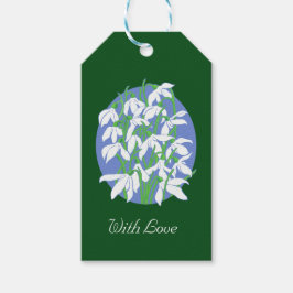 Etiquetas Para Regalos Nieve sobre fondo azul suave de ovario en verde