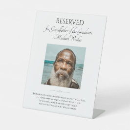 Expositor En L Abuelo de graduado salva un monumento a la foto