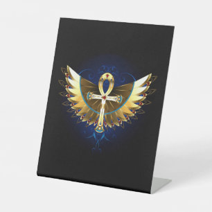 Expositor En L Ankh de oro con alas