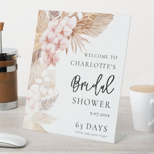 Expositor En L Bienvenida a la ducha de novia con flores rosadas  (In Situ)