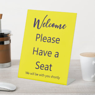 Expositor En L Bienvenido Por Favor Tome un Asiento Texto Amarill