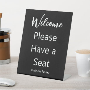 Expositor En L Bienvenido Tenga un nombre de negocio de asiento n