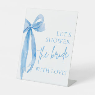 Expositor En L Blue Bow Vamos a bañar a la novia con Rótulo de am