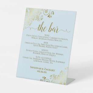 Expositor En L Boda de menú de bebidas azules y doradas en polvo