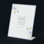 Expositor En L Duste Blue Wildflower Bridal Shower Mimosa Bar<br><div class="desc">Fije el tono para la celebración con este elegante cartel de Mimosa Bar, un guiño subestimado a su experta anfitriona. Con su tipografía de autor Blossom & Bliss y un murmullo de flores silvestres, se funde a la perfección en una estación de bebidas con una combinación de platos y una...</div>