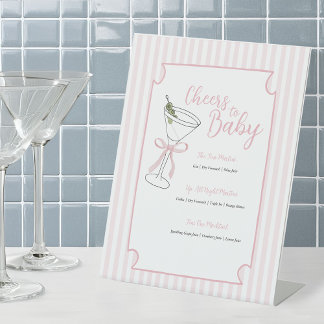 Expositor En L El Tini One está en el camino del Rótulo Bar