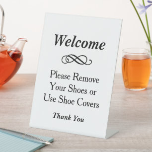 Expositor En L Elegante Bienvenida Quitar Zapatos