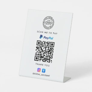 EXPOSITOR EN L ESCÁNEA DE CÓDIGO QR DE PAYPAL PARA PAGAR SU NEGOC