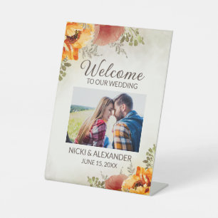 Expositor En L Foto de bienvenida de boda floral de naranja quema