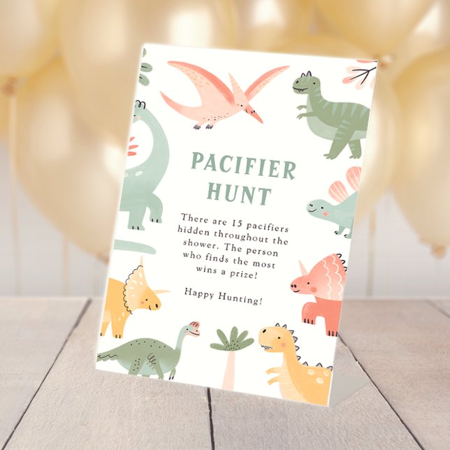 Expositor En L Letrero de Chupete de Dinosaurio (Dinosaur Table Top Baby Shower Pacifier Hunt Pedestal Sign by Painted Paperie
)