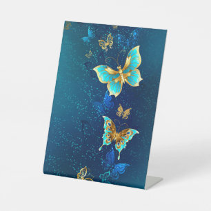 Expositor En L Mariposas doradas sobre fondo azul