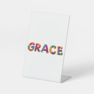 Expositor En L Nombre de gracia en el patrón de crochet vibrante