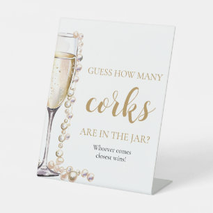 Expositor En L Perlas y prosecco adivinan cuántos corchos juegan