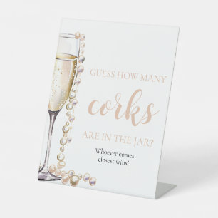 Expositor En L Perlas y prosecco adivinan cuántos corchos juegan