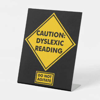 Expositor En L Precaución: Lectura Disléxica
