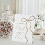 Expositor En L She's Tying the Knot Bridal Shower How Many Kisses<br><div class="desc">Add a playful and interactive element to your celebration with this elegant “She’s Tying the Knot” How Many Kisses bridal shower pedestal sign, perfect for game tables and activity stations. Designed to complement chic, feminine, and romantic bridal shower themes, this sign guides guests to participate in the fun guessing game...</div>