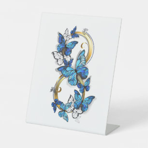 Expositor En L Símbolo infinito de mariposas Morpho azules
