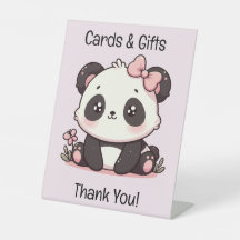 Tarjetas y regalos aquí señalización de la mesa de