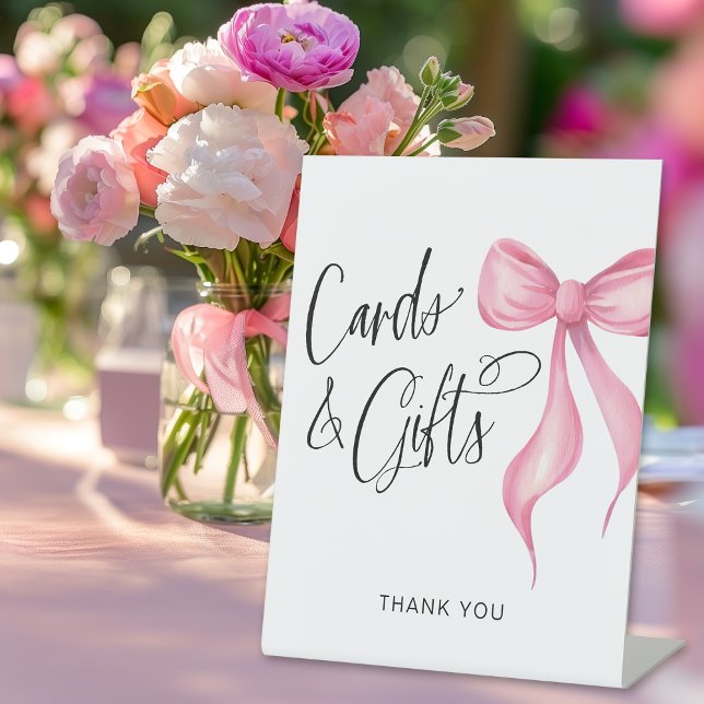 Expositor En L Tarjetas y regalos Coquette Pink Bow (Shown on an 8" x 10" pedestal sign)