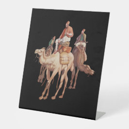 Expositor En L Una caravana de camellos árabes viajando de noche