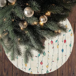 Falda Para El Árbol De Navidad De Poliéster Vintage Fun Colorful Fa La Navidades String Light<br><div class="desc">Añada un toque retro juguetón a su decoración de vacaciones con esta falda de árbol de navidad de estilo vintage Fa La Navidad de color canto. Con luces de cuerda brillantes y extravagantes en una variedad de colores festivos, este diseño aparece con un fondo neutral, creando un divertido pero clásico...</div>