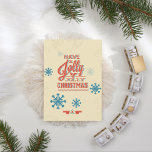 Falso navidad de la tipografía del copo de nieve<br><div class="desc">Moderno,  colores 3D de rojo y azul así como los copos de nieve azules que flotan alrededor.  Elementos minúsculos de la cinta abajo con los árboles de navidad en rojo y resumidos otra vez en azul.  Texto de la tipografía en fondo beige.</div>