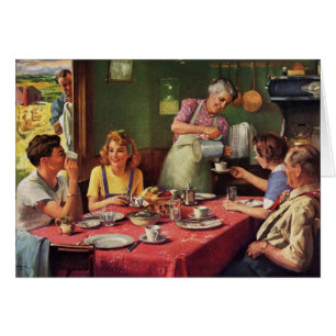 Familia antigua desayunando en la cocina