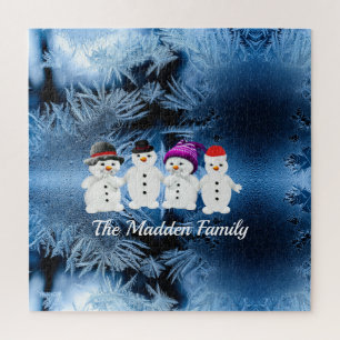 Familia de hombres de nieve de cuatro rompecabezas