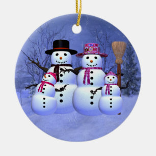 Familia de la nieve con el ornamento de 2 chicas