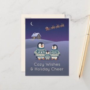 Familia de pingüinos lindos con suéteres Navidad