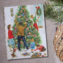 Familia retro vintage decorando árbol de Navidad