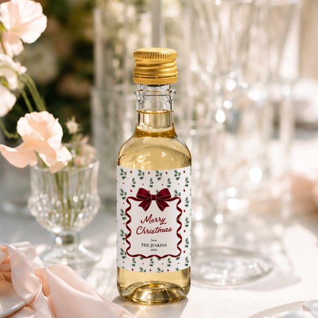 Favor de fiesta de Navidad personalizado (Merry Christmas Red Bow and winter greenery mini wine label party favors
)