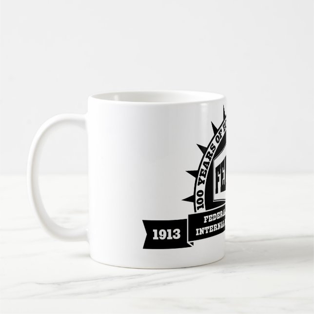 FED y taza del Centennial del IRS (Izquierda)