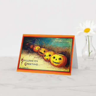 Feliz Halloween Saludos Calabazas en una tarjeta d