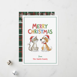 Feliz Navidad al gato y al perro con sombreros de 