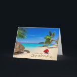 Feliz Navidad Con Sombrero De Papá Noel En Los Tró<br><div class="desc">Feliz Navidad con sombrero santa en la playa tropical © y ® Bigstock® - Todos los derechos reservados.</div>