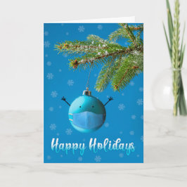 Feliz Navidad: Ornamento de árbol de Navidad en má