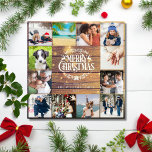 Feliz Navidad Rustic Wood 12 Collages de fotos<br><div class="desc">Envíe sus mejores deseos a sus Navidades con esta elegante tarjeta de vacaciones que incluye sus 12 fotos favoritas que capturan su año con un fondo rústico de madera. Diseñado por Thisisnotme©</div>