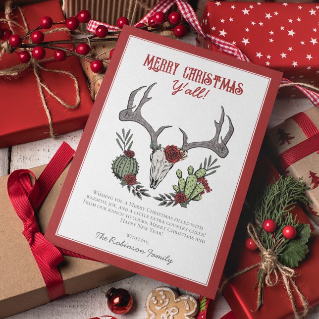 Feliz Navidad y todos los renos cráneo y cactus (Country Western Merry Christmas Y'All Xmas Card. Hand-Drawn Reindeer, Antlers, Cactus, Red Roses.)