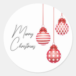Feliz pegatina navideño con adornos rojos