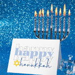 Feliz tarjeta de vacaciones estilo Hanukkah<br><div class="desc">Esta tarjeta de felicitación de Hanukkah presenta un diseño moderno y lúdico que seguro traerá alegría a sus destinatarios. La parte delantera de la tarjeta muestra de manera prominente la frase "feliz feliz feliz" en una letra en minúscula. El centro "feliz" es azul claro, mientras que el texto superior e...</div>