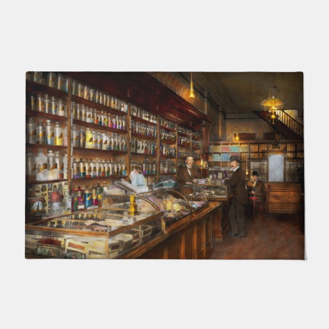 Felpudo Apothecary - Una visita a la química 1913 (Anverso)