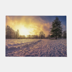 Felpudo Atardecer sobre el nevado parque invernal