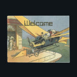 Felpudo Auto convertible de vintage Science Ficción Steamp<br><div class="desc">Fácil de personalizar esta alfombra de bienvenida con el texto de su personalizado! Ilustracion Vintage Victoriano futurista viajes y transporte ciencia ficción diseño de punk de vapor con un auto convertible volador con alas. El chófer está a punto de aterrizar su coche futurista (o es un avión) en la tienda...</div>