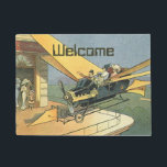 Felpudo Auto convertible de vintage Science Ficción Steamp<br><div class="desc">Fácil de personalizar esta alfombra de bienvenida con el texto de su personalizado! Ilustracion Vintage Victoriano futurista viajes y transporte ciencia ficción diseño de punk de vapor con un auto convertible volador con alas. El chófer está a punto de aterrizar su coche futurista (o es un avión) en la tienda...</div>