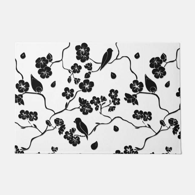 Felpudo Aves con motivos blancos y negros en flores de cer (Anverso)