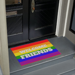 Felpudo Bandera arcoíris de Orgullo Gay Bienvenidos Amigos